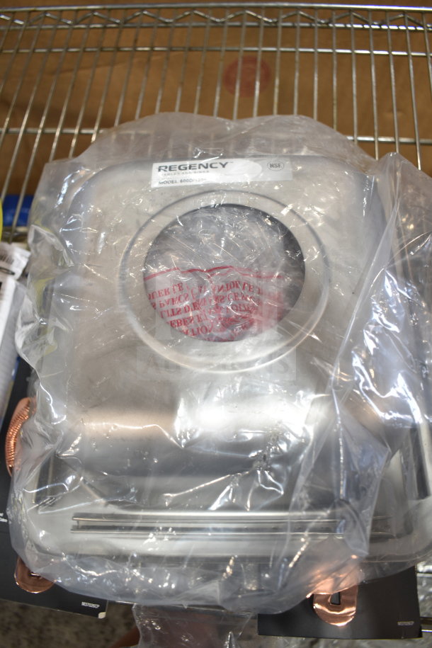 Brand new Regency 600DI1995 single compartment sink, 18GA 304 stainless steel, 9x9x5 inches, in protective wrapping.