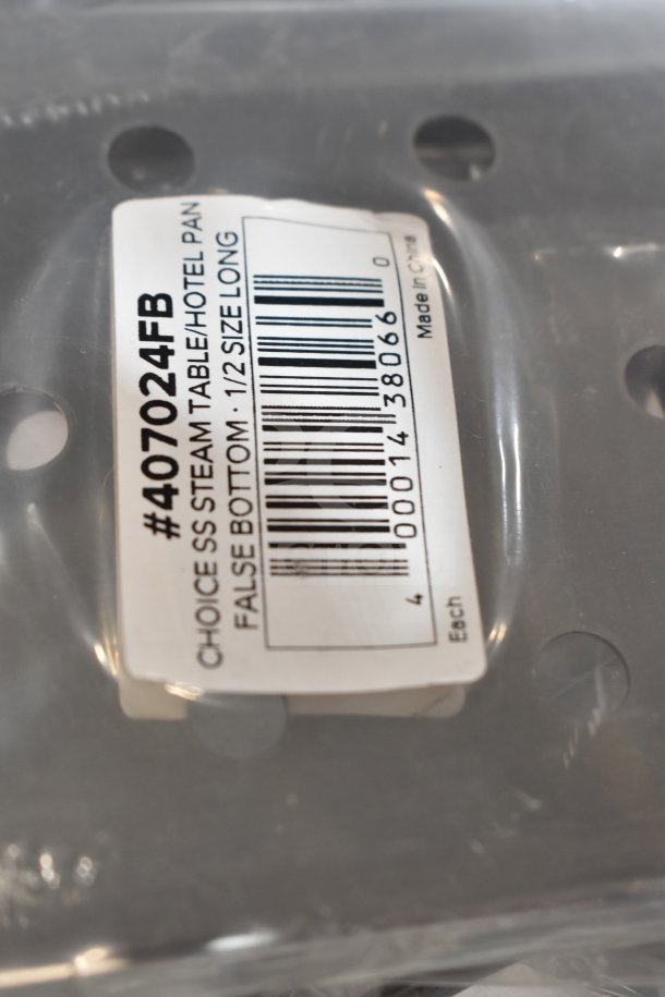 Brand new Choice stainless steel steam table pan false bottom, model #407024FB, 1/2 size, label indicates "Scratch and Dent".