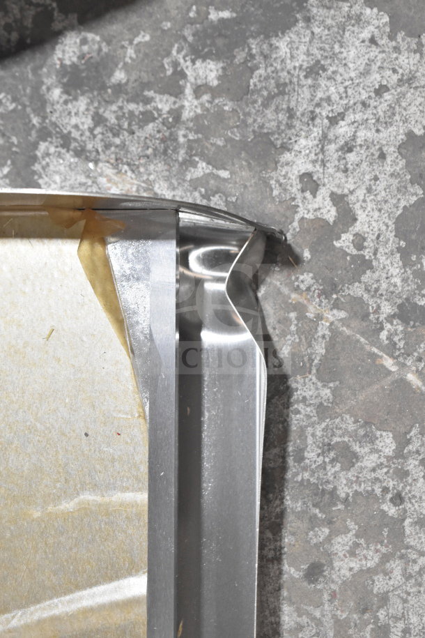 Brand new Backyard Pro griddle plate for LPG30/LPG60 grills, scratch and dent, stainless steel with visible packaging.