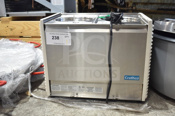 Brand new Crathco D25-4 beverage dispenser base, two 5-gallon bowls, high-impact plastic, 115V, scratch and dent condition.