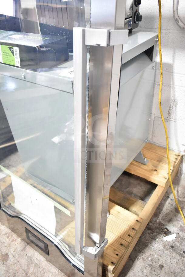 Brand new Estella 34815444 glass door for MCC220, visible scratch and dent, stainless steel frame, packaged in original box.