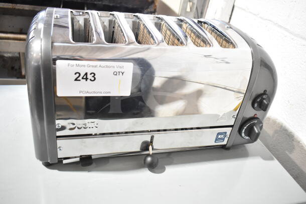 BRAND NEW SCRATCH AND DENT Cadco CTW-6M 6-slice toaster, 1" slots, 220V, 1 phase. Minor exterior blemishes visible.