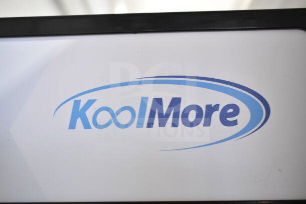 KoolMore KM-MDF-17S logo on commercial freezer; note "Scratch and Dent" condition with glass damage.