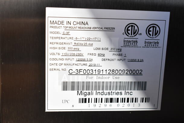 Migali C-3F Commercial 3 Door Reach-In Freezer label showing model, voltage, refrigerant, and manufacturing details.