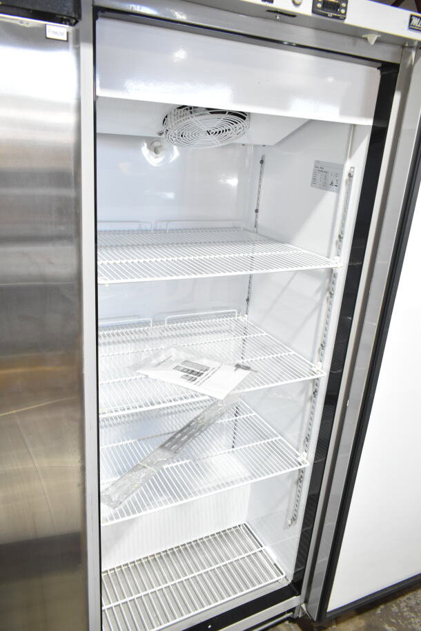 Brand new KoolMore SR60V commercial reach-in freezer, single door, 115 volts, with minor scratches and dents.