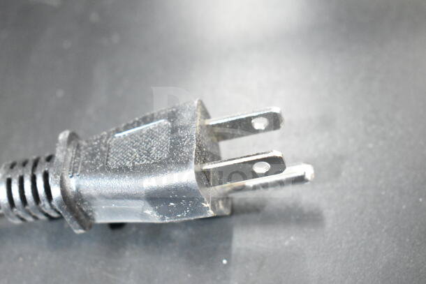 Black plug for Avantco 177CU30CETL coffee urn, close-up. Suitable for 120 volts, 1 phase power supply.