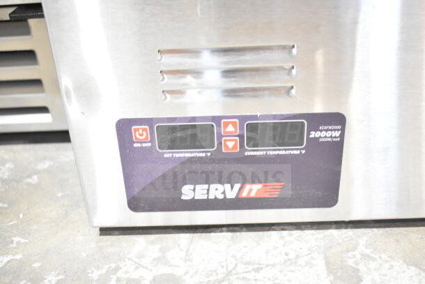 Brand new ServIt 423FW200D dual well electric food warmer with digital controls, 120V, minor scratches, 2000W power.