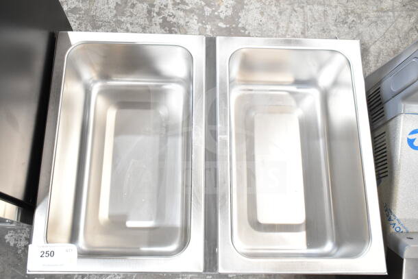 Brand new ServIt 423FW200D dual well electric countertop food warmer, stainless steel, digital controls, minor scratches.