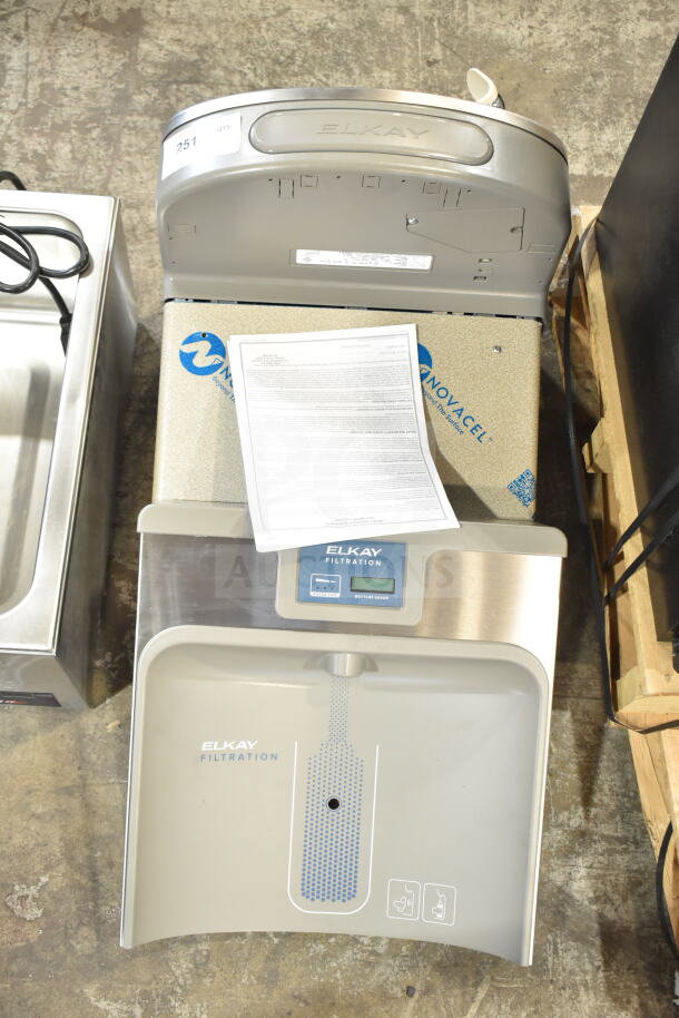 Brand new Elkay ENKLZS8WS_1A light gray hands-free filtered bottle filling station with drinking fountain, 115V, minor dents.