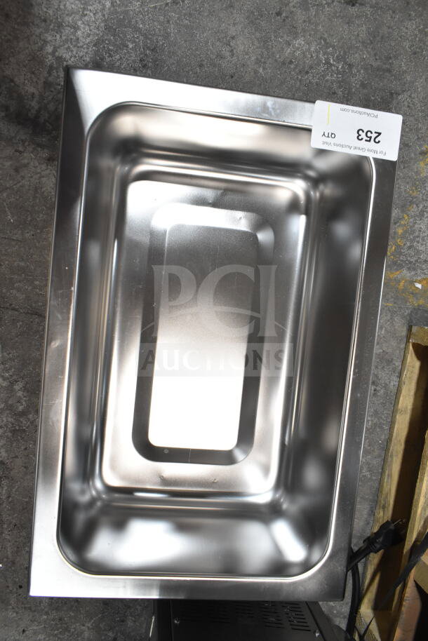 Brand new Avantco 177W50 12" x 20" electric countertop food warmer, stainless steel, 120 volts, 1 phase, minor dents.