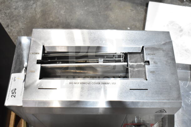 Brand new Avantco 177CPBTR66A commercial vertical bun toaster, 120V, with crown and heel slot labels, slight dents visible.