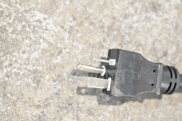 Close-up image of a three-prong power plug, part of the Avantco 177CPBTR66A commercial bun toaster, 120V, 1 phase.