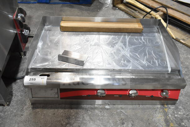 Brand new Avantco 177EG30N 30" electric countertop griddle, 208/240V, 1 phase, minor scratches, visible control knobs.