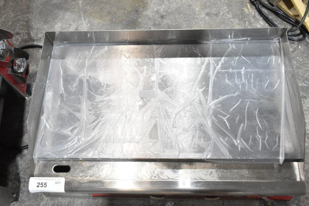 Avantco 177EG30N 30" electric griddle, new, scratch and dent condition, 208/240 volts, 1 phase, protective film on surface.