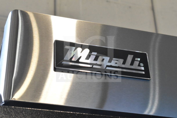 Brand new Migali C-1F-LHH-HC commercial reach-in freezer, single door, 115 volts, scratch and dent condition.