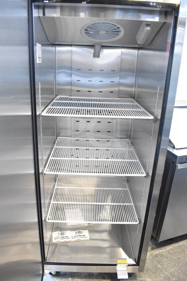 Brand new Migali C-1F-LHH-HC commercial single door freezer. Scratch and dent, 115V, 1 phase, with serial number visible.