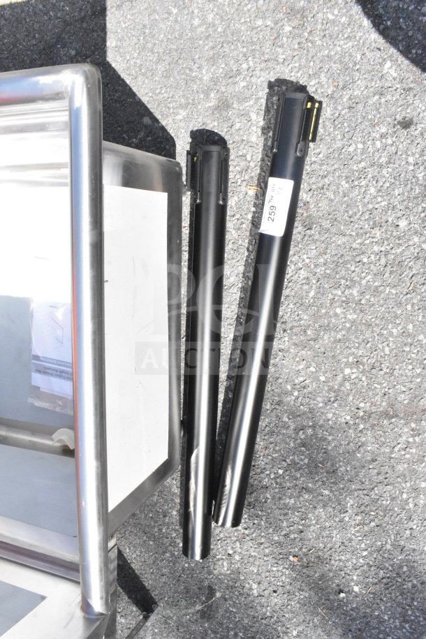 2 new Lancaster Table & Seating 36" black metal stanchions with 78" retractable belt, scratch and dent, no base included.