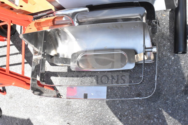 Brand new roll top chafer with minor scratches visible. Stainless steel construction. Shown partially disassembled.