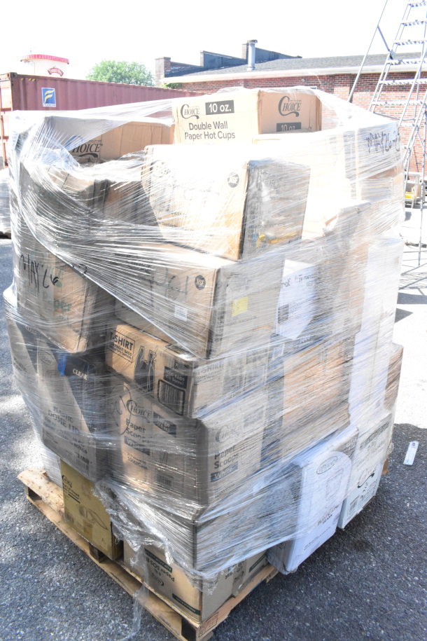 Pallet wrapped with boxes labeled "Choice 10 oz. Double Wall Paper Hot Cups" in outdoor setting. New scratch and dent items.