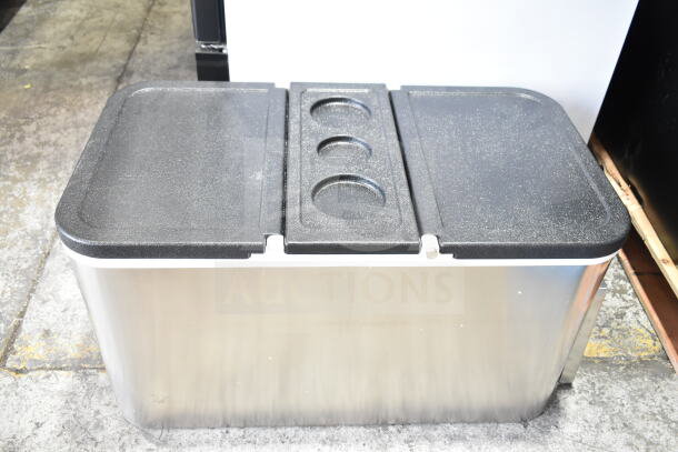 Choice 100 Qt. stainless steel beverage cooler with black lid and cup holder indentations, in good condition.