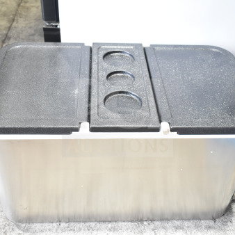 Choice 100 Qt. stainless steel beverage cooler with black lid and cup holder indentations, in good condition.