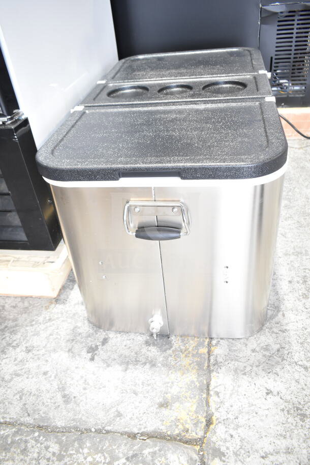 Choice 100 Qt. stainless steel beverage cooler, black lid, sturdy handles, excellent condition, ideal for large events.