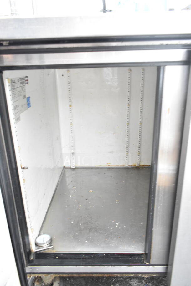 True TWT-60-32 2 Door Work Top Cooler, stainless steel, visible internal shelving, good condition, 115V, 1 Phase.