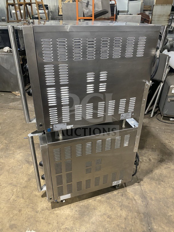 Turbofan Moffat Series E32D5 stainless steel double stacked convection oven, electric, steam injection, on casters.