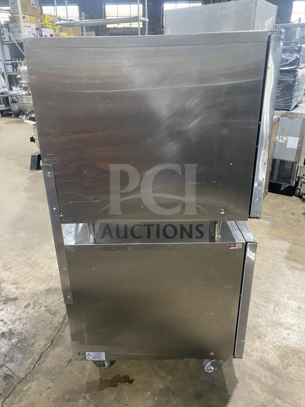 Turbofan Moffat E32D5 stainless steel electric double stacked convection oven on casters, commercial grade.