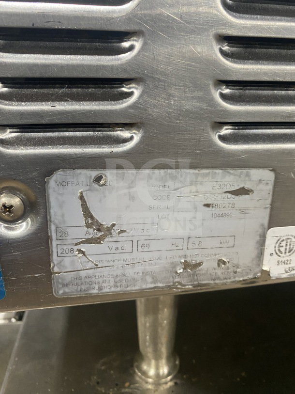 Stainless steel Turbofan E32D5 convection oven on casters, steam injection, electric, visible model and serial number label.