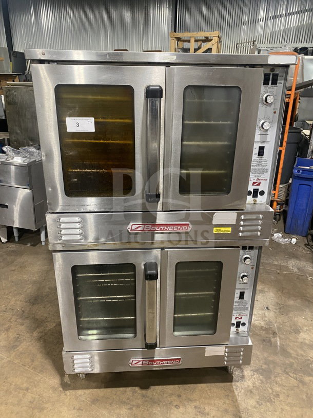 Southbend commercial stainless steel double stacked convection oven with thermostatic control and wired oven rack.