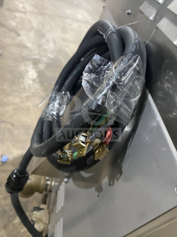 Alto-Shaam CTX4-10EC Combi Oven cord and plug, taped and unwired, showing electric power connection.