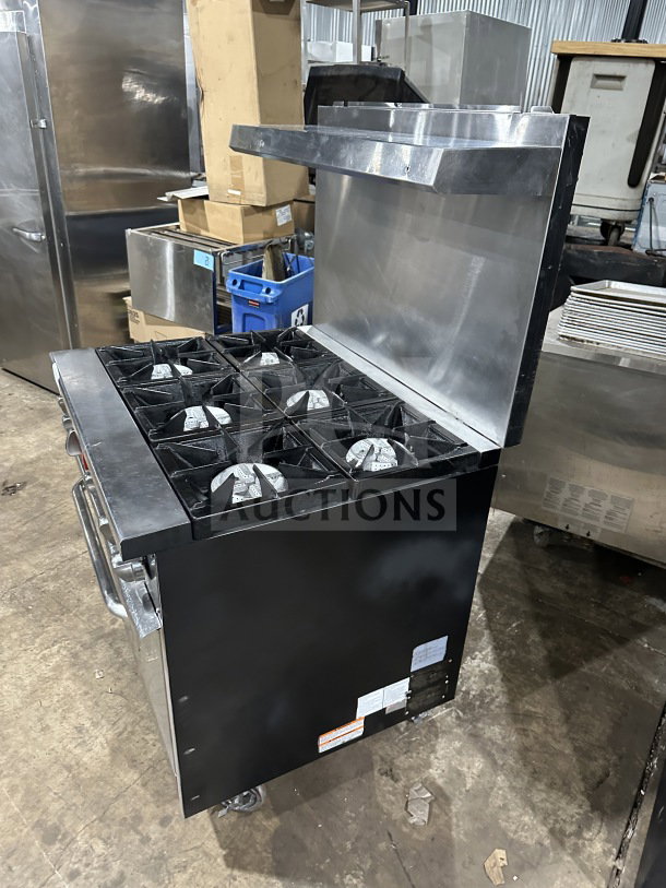 Qualite commercial stainless steel gas range/oven combo, model QLG36NG, featuring six burners, backsplash, salamander shelf, and casters.