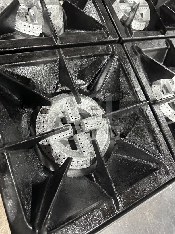 Commercial stainless steel gas range with cast iron burners, model QLG36NG by Qualite.