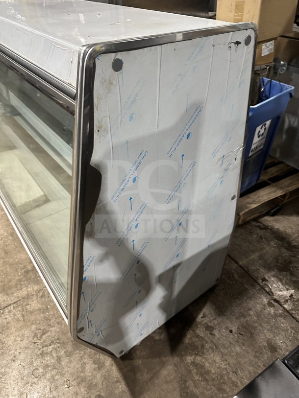 Leader 2019 stainless steel 60" slanted glass refrigerated deli merchandiser, model ERHD60ESR, with adjustable shelves.