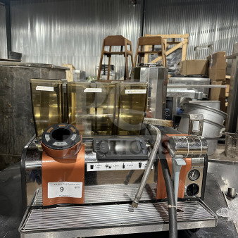 Thermoplan Mastrena II Series M2CS commercial espresso machine with drip tray, 3 bean hoppers, stainless steel, 208V.