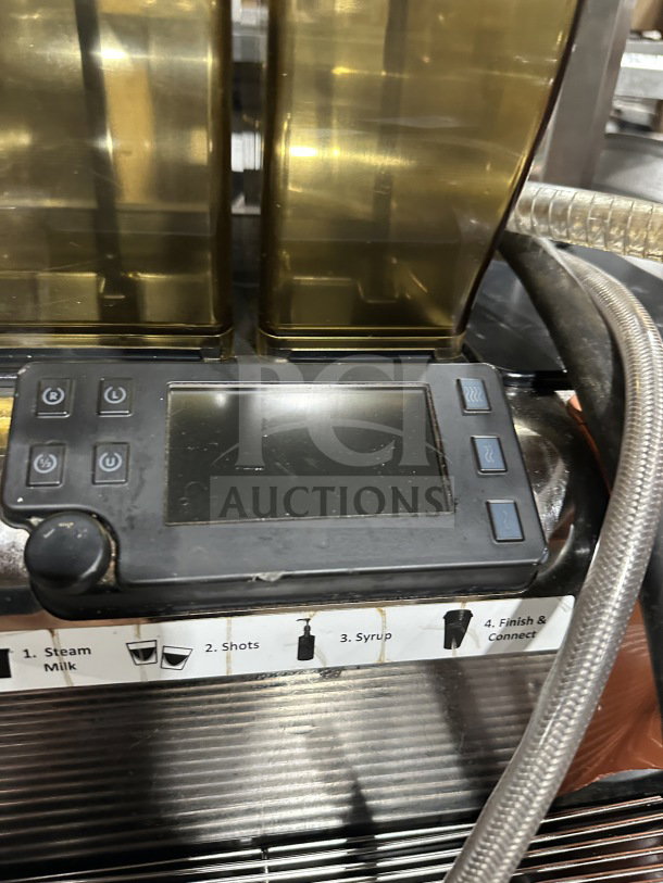 Thermoplan Mastrena II Series espresso machine with control panel, three bean hoppers, and drip tray. Model M2-CS, SN: 410025090.