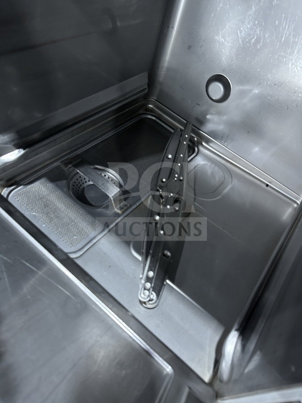 Hobart LXe Series stainless steel undercounter dishwasher, model LXEH. Interior view, clean and intact. Energy Star Certified.