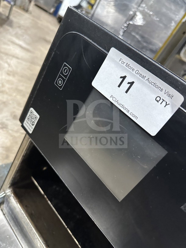 MerryChef Eikon E2S countertop rapid cook oven, black, electric, model SN: 2210213092770, 208/240V, 1 phase.