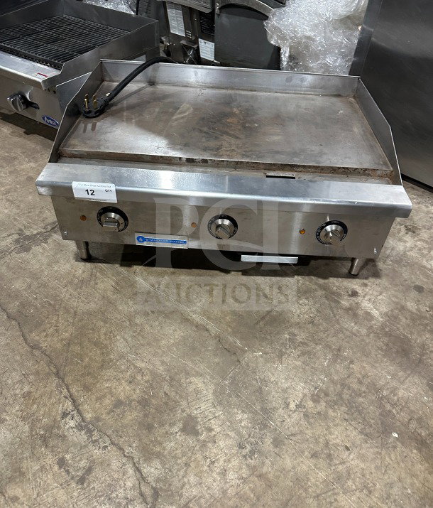 Stainless steel 36" Standard Range flat griddle, electric, model SR-EG36, with thermostatic controls, legs, and splash guards.