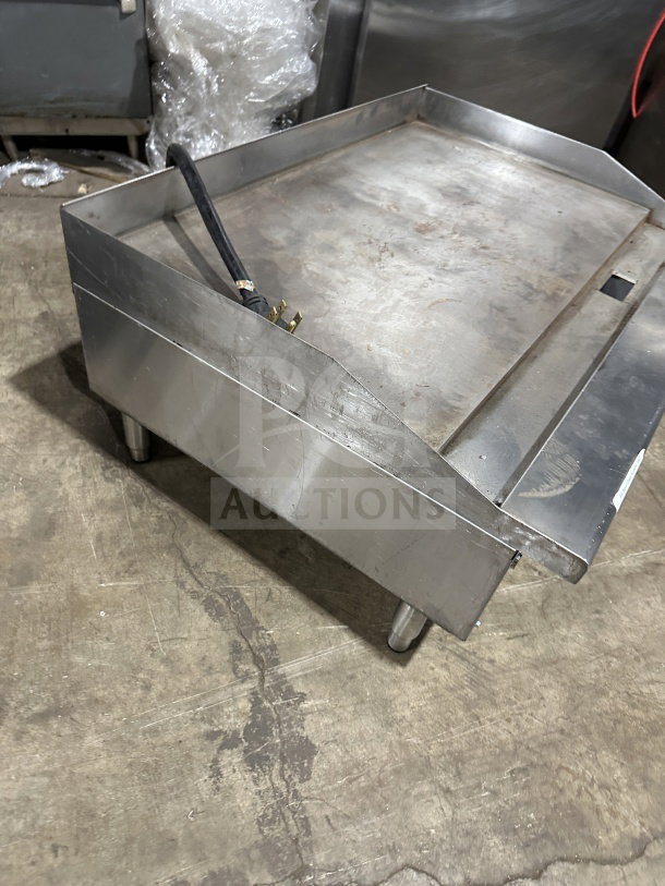 Standard Range SR-EG36 stainless steel electric countertop griddle, 36", with thermostatic controls, back/side splash, on legs.