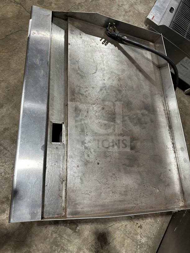 Stainless steel electric countertop flat griddle, 36", by Standard Range, model SREG36. Features thermostatic controls, back and side splash, 208/240V 1/3 phase. Visible wear.