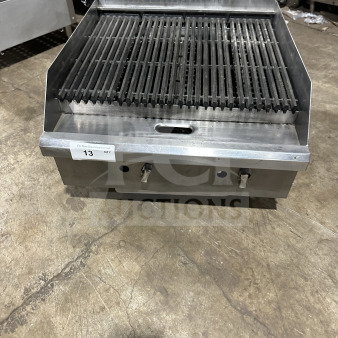 Commercial stainless steel charbroiler, model TMRC36. Countertop, radiant heat, gas and electric powered. Good condition.