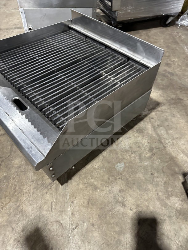 Commercial stainless steel charbroiler, Model TMRC36, gas/electric-powered, countertop design, excellent condition.