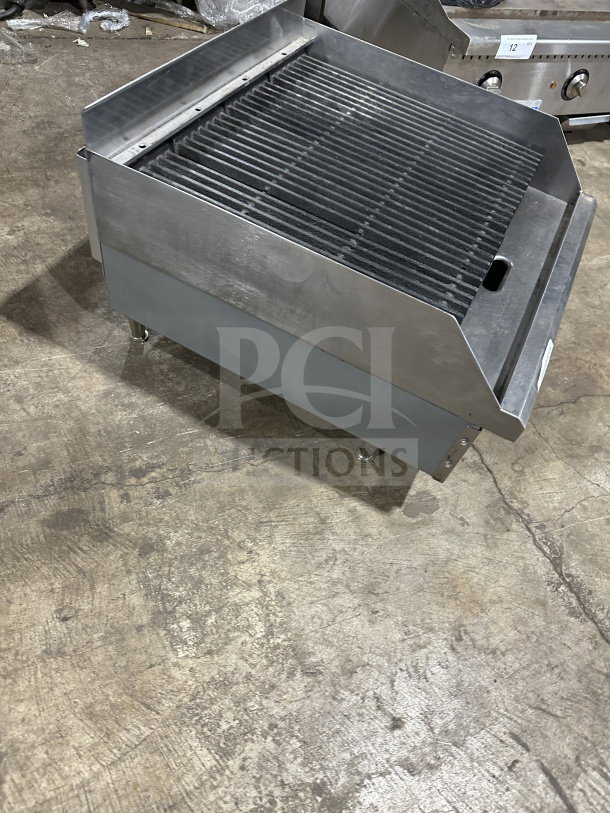 Commercial stainless steel countertop radiant charbroiler, model TMRC36. Gas and electric powered, excellent condition.