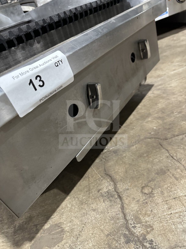 Commercial stainless steel countertop radiant charbroiler, gas and electric powered, Model TMRC36, auction tag visible.