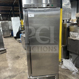 Maxx Cold stainless steel single door reach-in freezer/refrigerator with poly-coated wired rack and casters, in good condition.