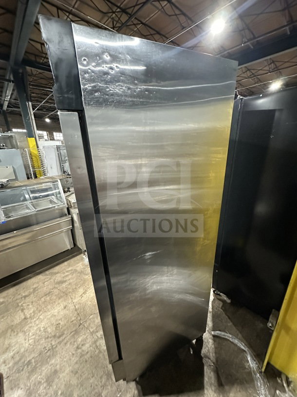 Maxx Cold commercial stainless steel single door reach-in freezer/refrigerator, electric powered, on casters, with poly coated rack.