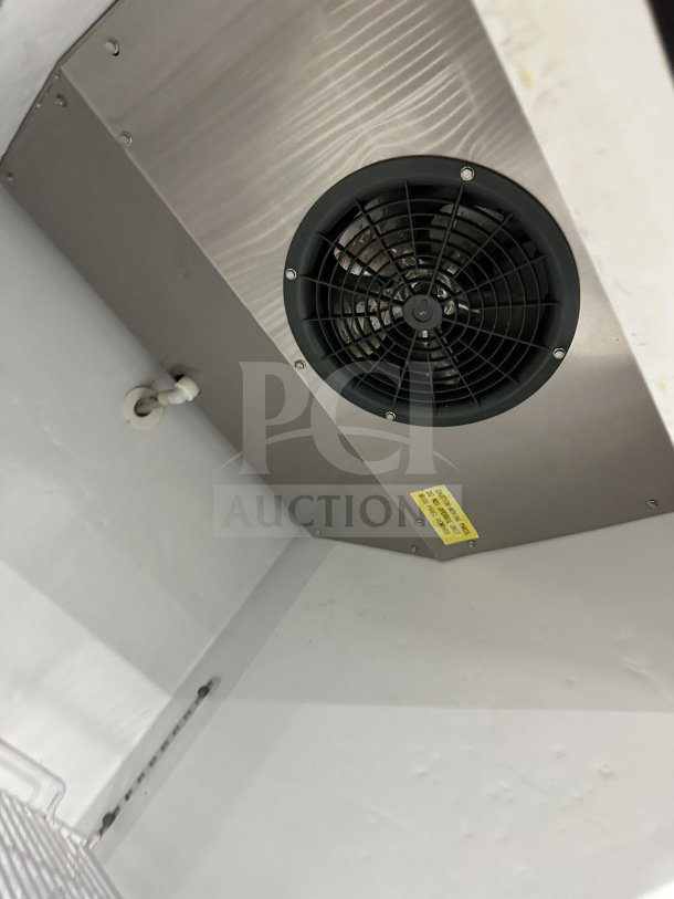 Maxx Cold commercial stainless steel reach-in freezer/refrigerator interior, fan shown. Includes poly coated wired rack, on casters.