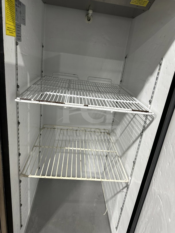 Maxx Cold stainless steel reach-in freezer/refrigerator, single door, poly-coated wire racks, on casters, commercial-grade.
